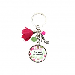 Porte clés "Une kiné qui déchire"